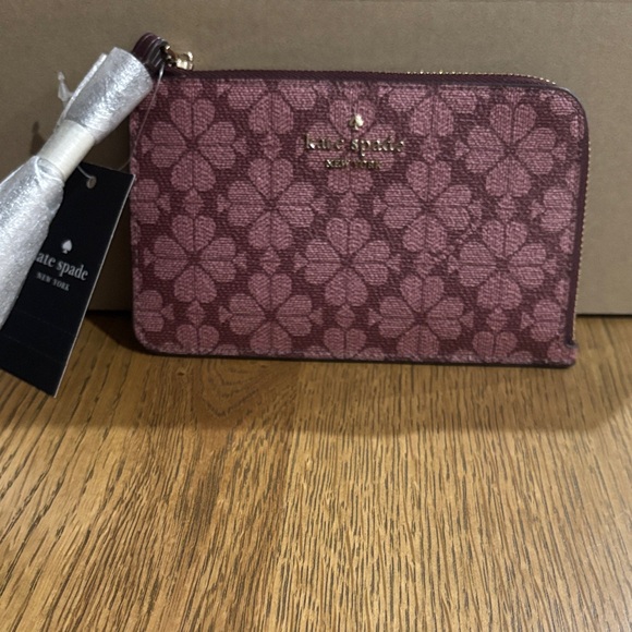 kate spade Handbags - Kate Spade Burgundy Floral wristlet
